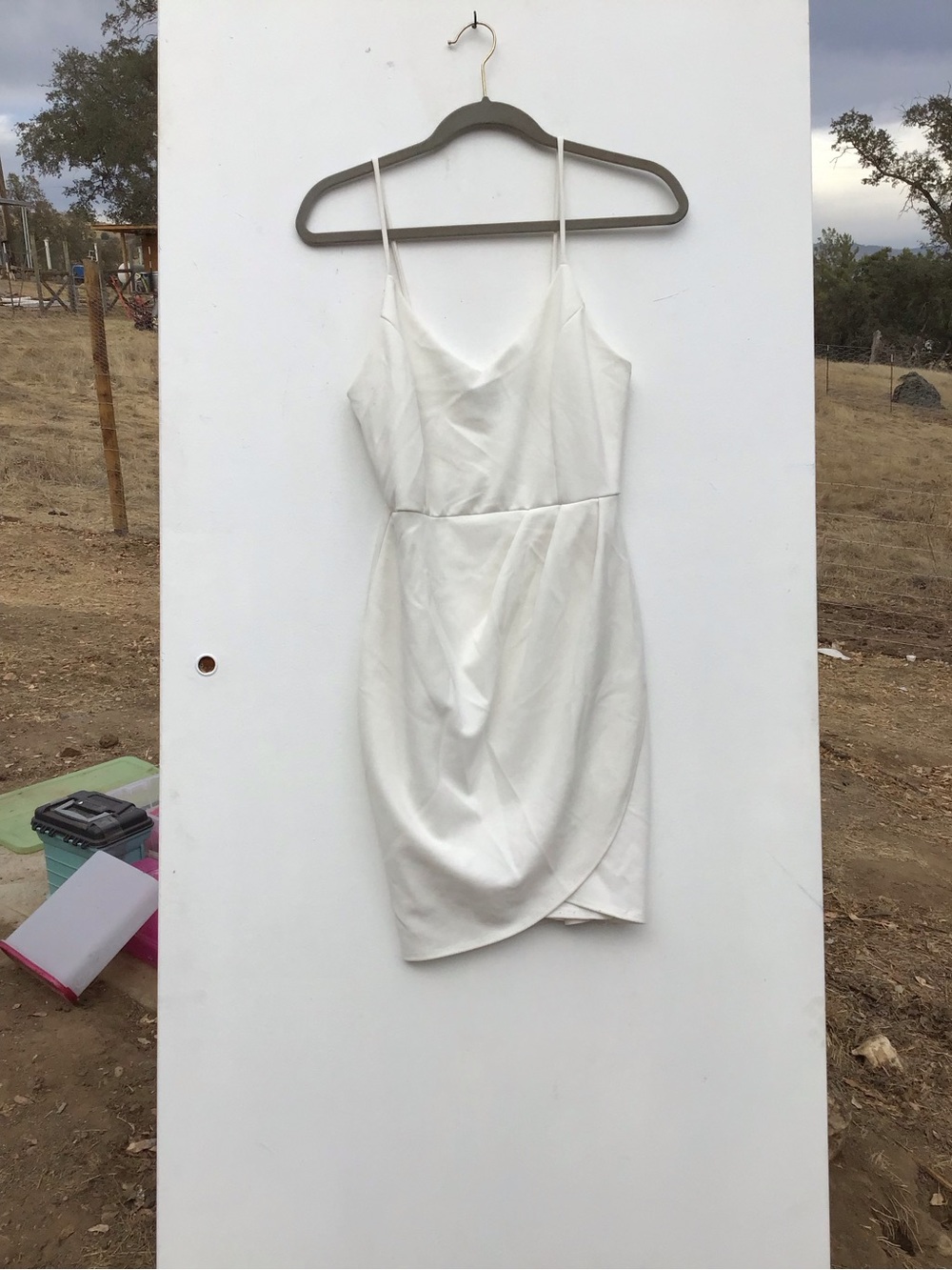 Lulu's White Spaghetti-Strap Tulip Hem Mini Dress
